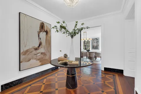 a room with furniture and a chandelier