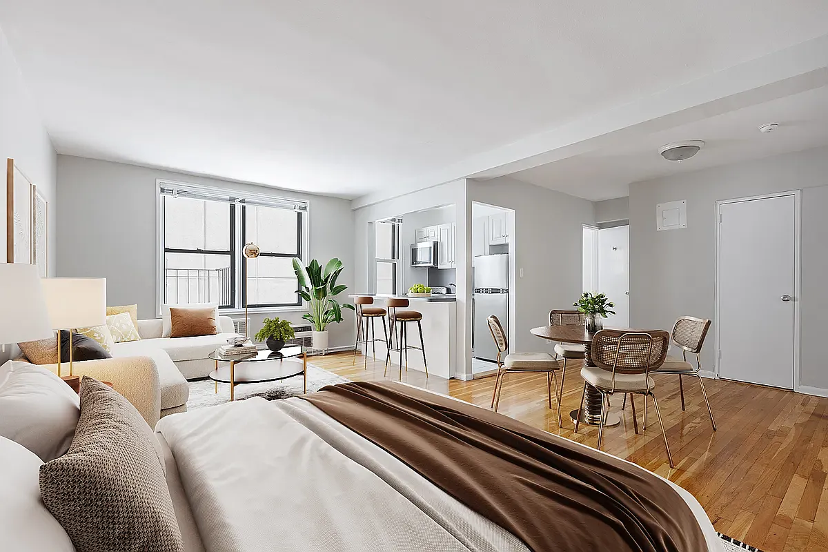85 4th Avenue, Unit 5MM Manhattan, NY 10003 - Photo 1 of 6 a living room with furniture and a large window