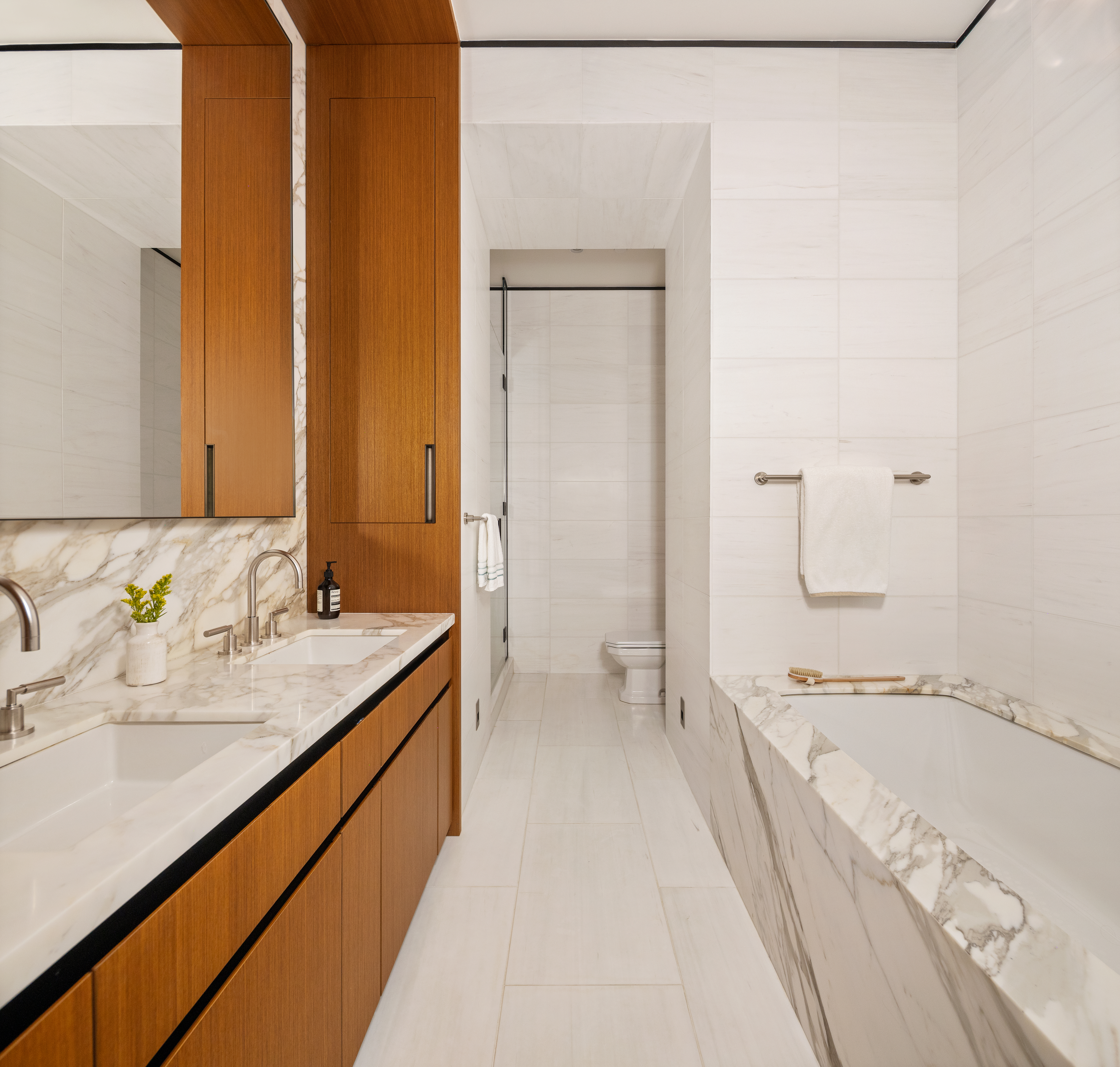 15 East 30th Street, Unit 26C Manhattan, NY 10016 - Photo 5 of 15 a bathroom with a granite countertop sink and a mirror