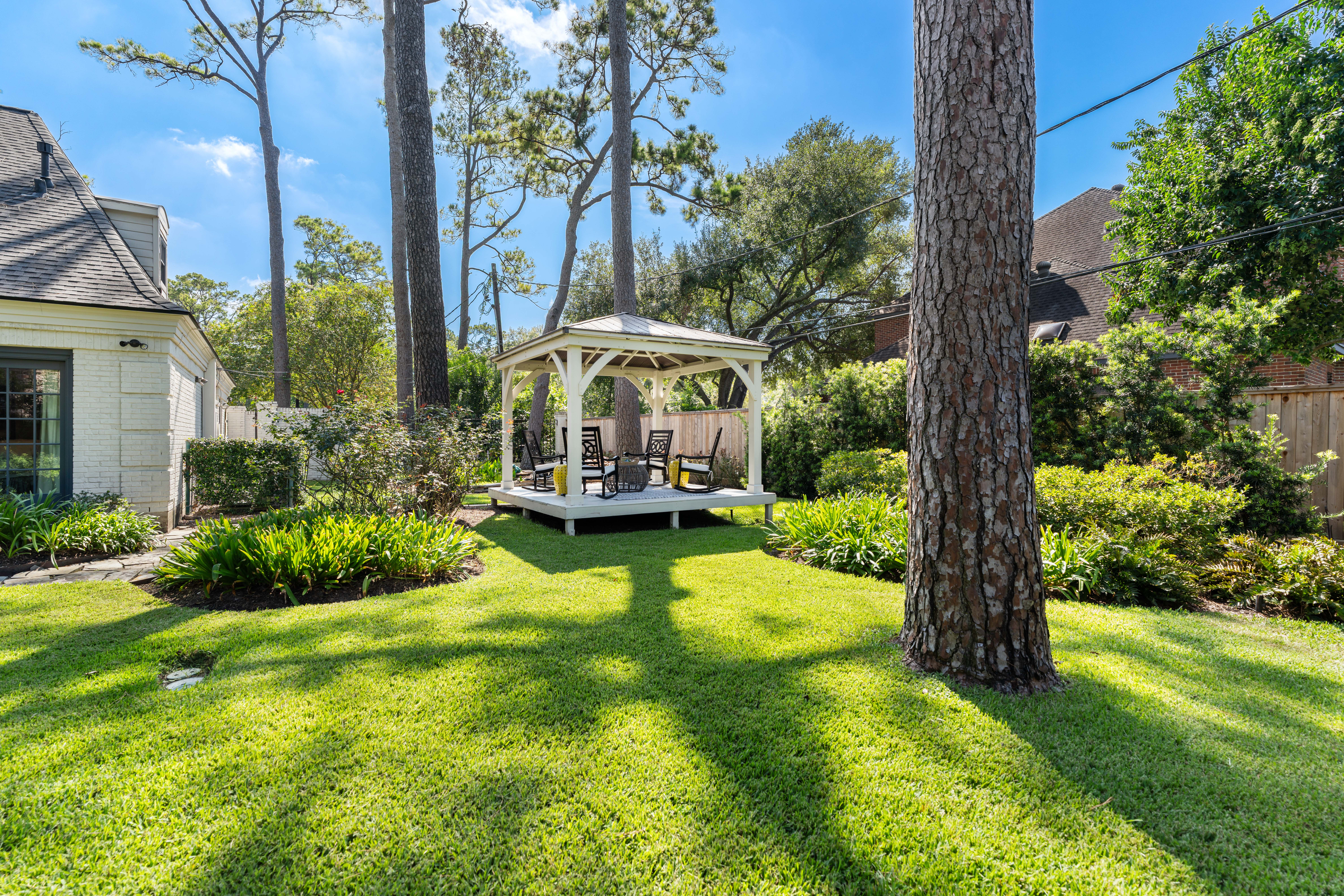 711 Pifer Road Houston, TX 77024 - Photo 51 of 53 a view of a swimming pool with a patio