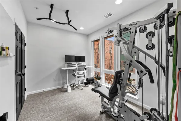 a view of a room with gym equipment