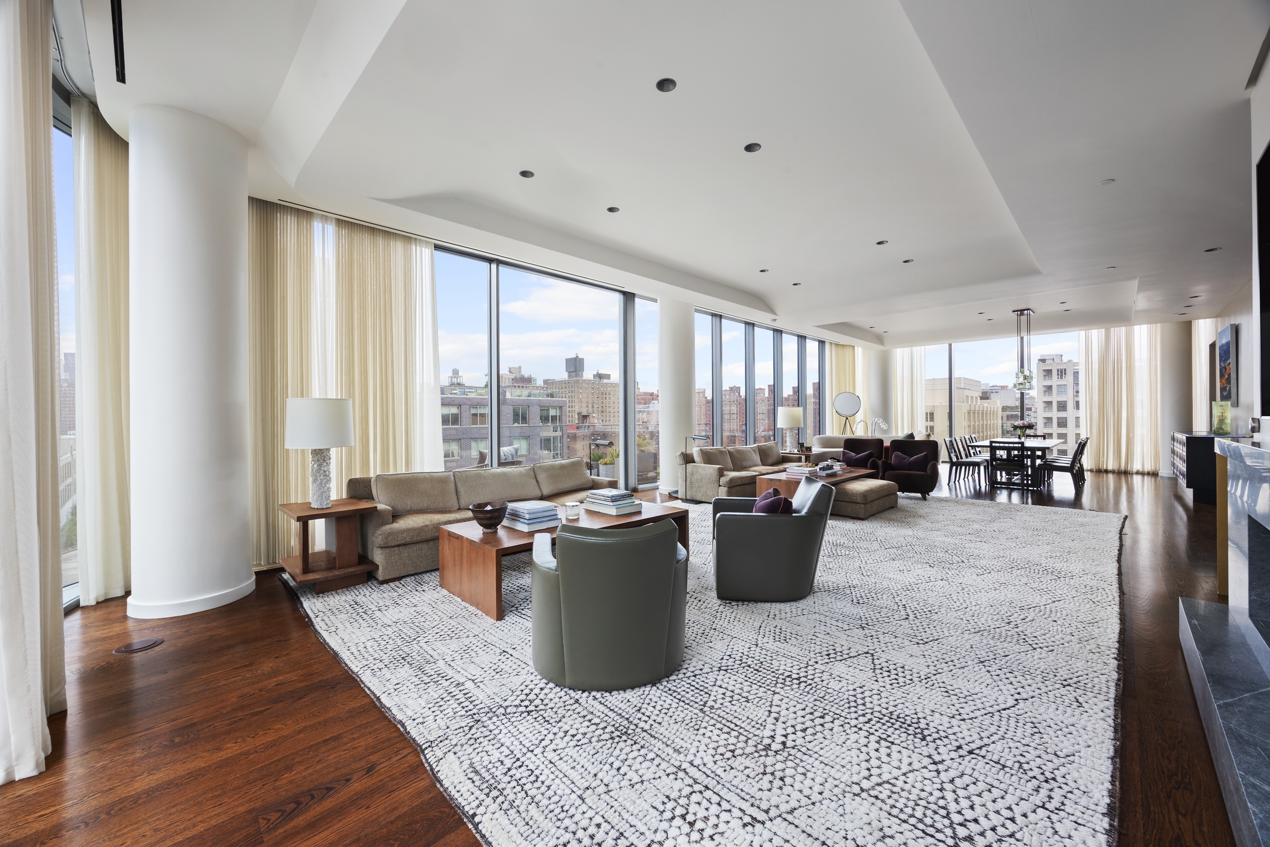 520 West 28th Street, Unit PH37 Manhattan, NY 10001 - Photo 5 of 45 a living room with furniture and a large window