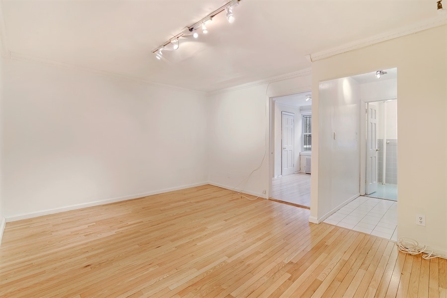 49 Saint Marks Avenue, Unit 1 Brooklyn, NY 11217 - Photo 9 of 21 a view of empty room with wooden floor