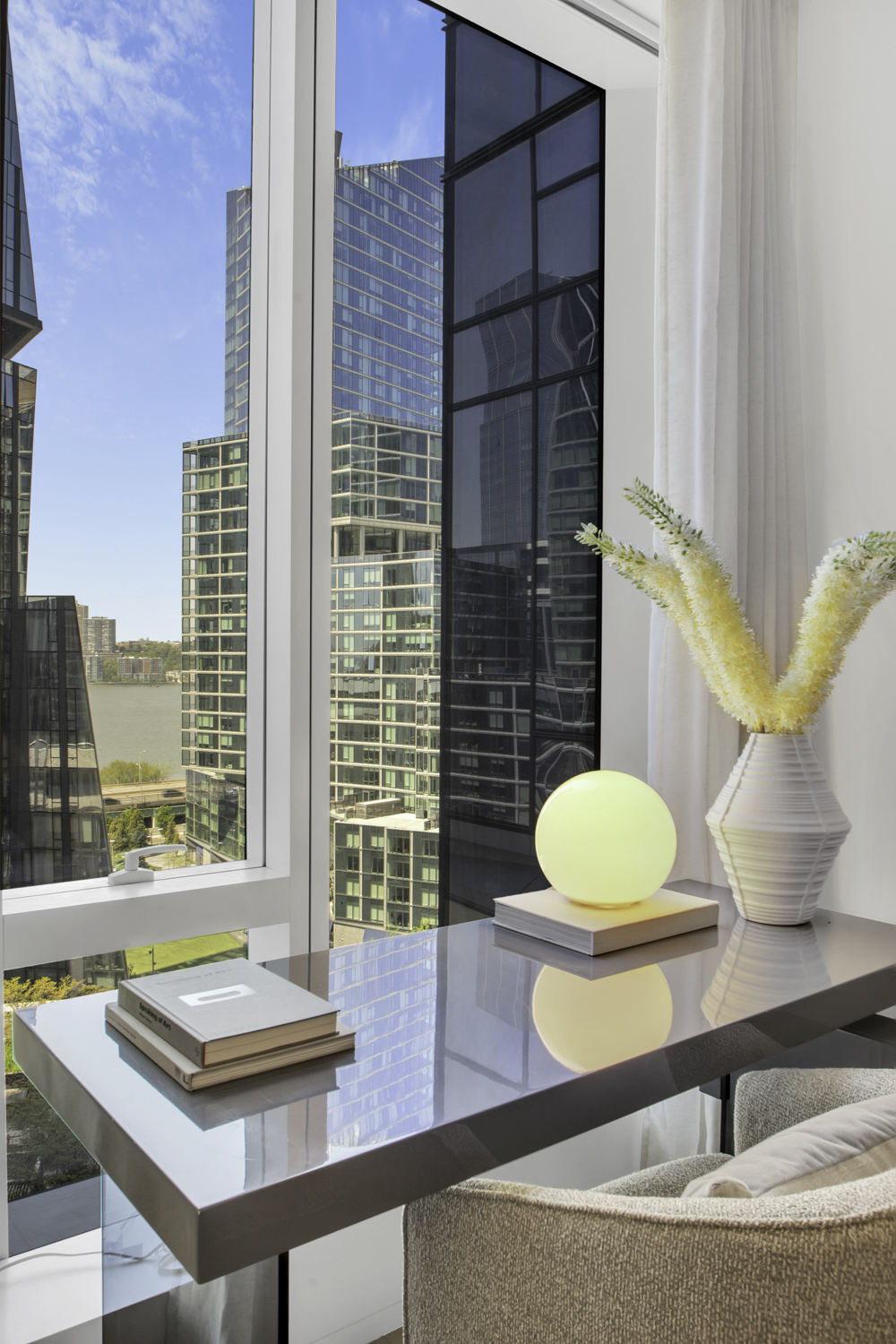 1 West End Avenue, Unit 10A Manhattan, NY 10023 - Photo 20 of 38 a bathroom with a toilet sink and mirror