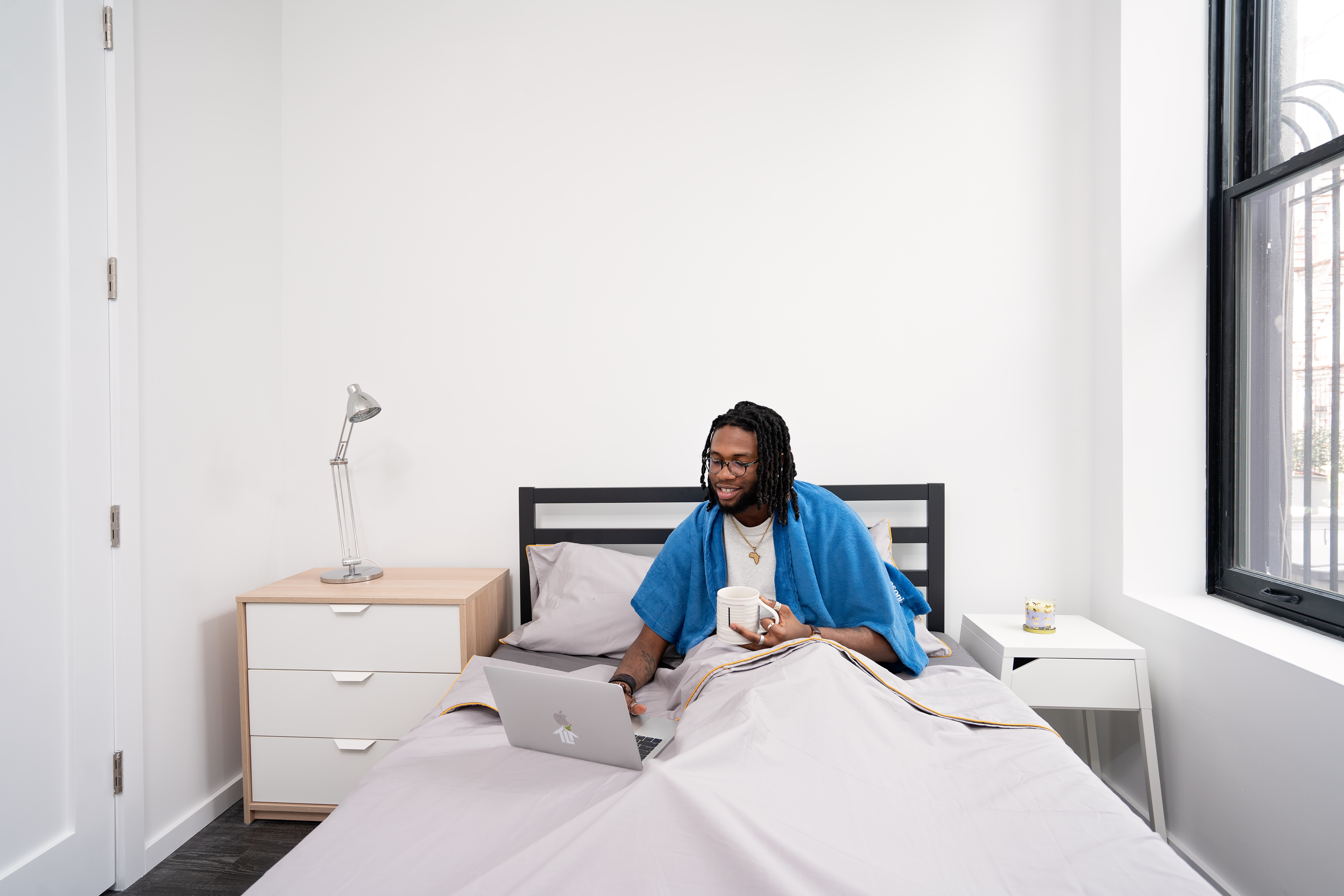 415 Broadway, Unit 3A Brooklyn, NY 11211 - Photo 6 of 8 a bed room with a bed and a chair