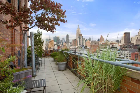 a view of a balcony with city view