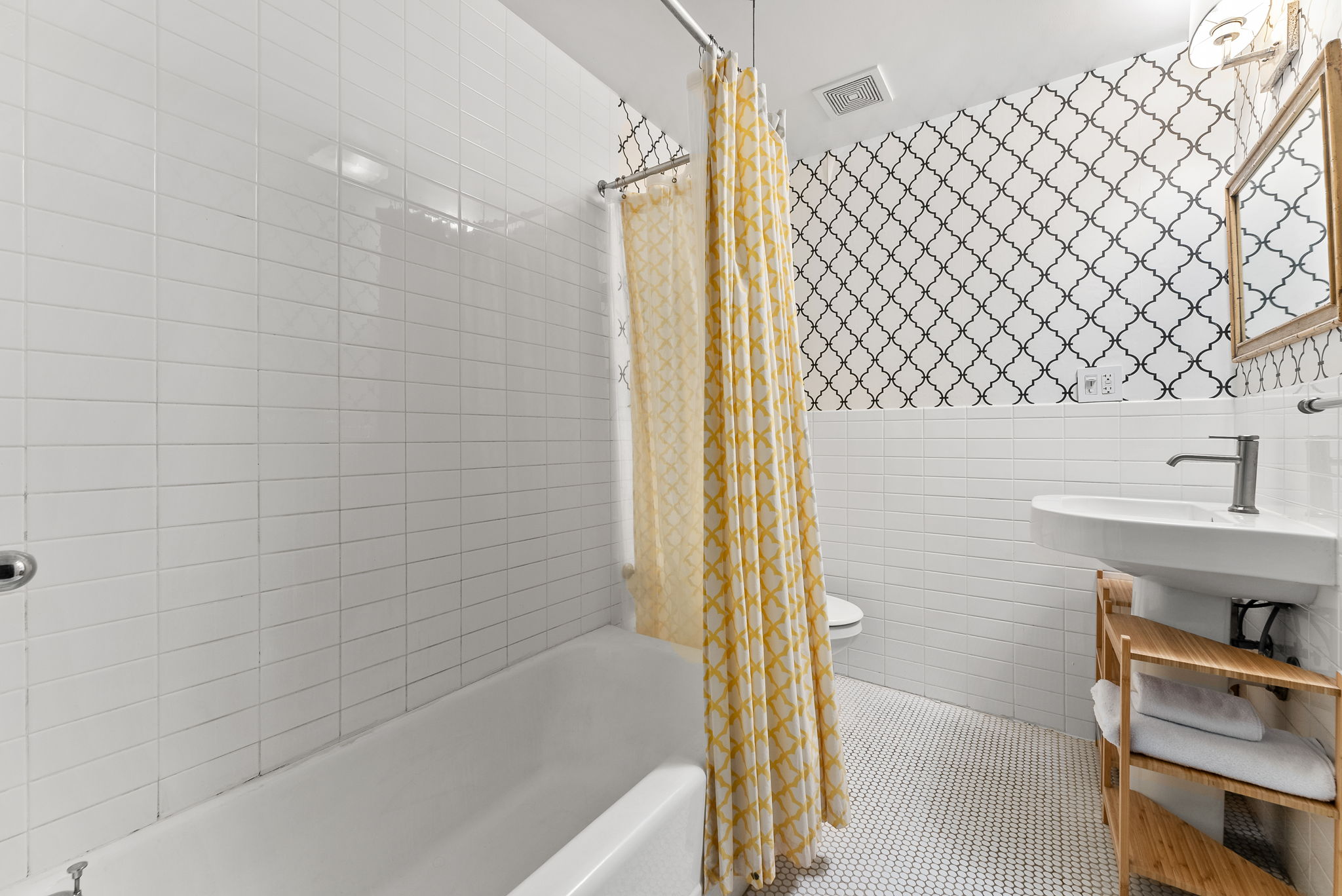 6 Virginia Place Brooklyn, NY 11213 - Photo 17 of 26 a bathroom with a bathtub and a shower