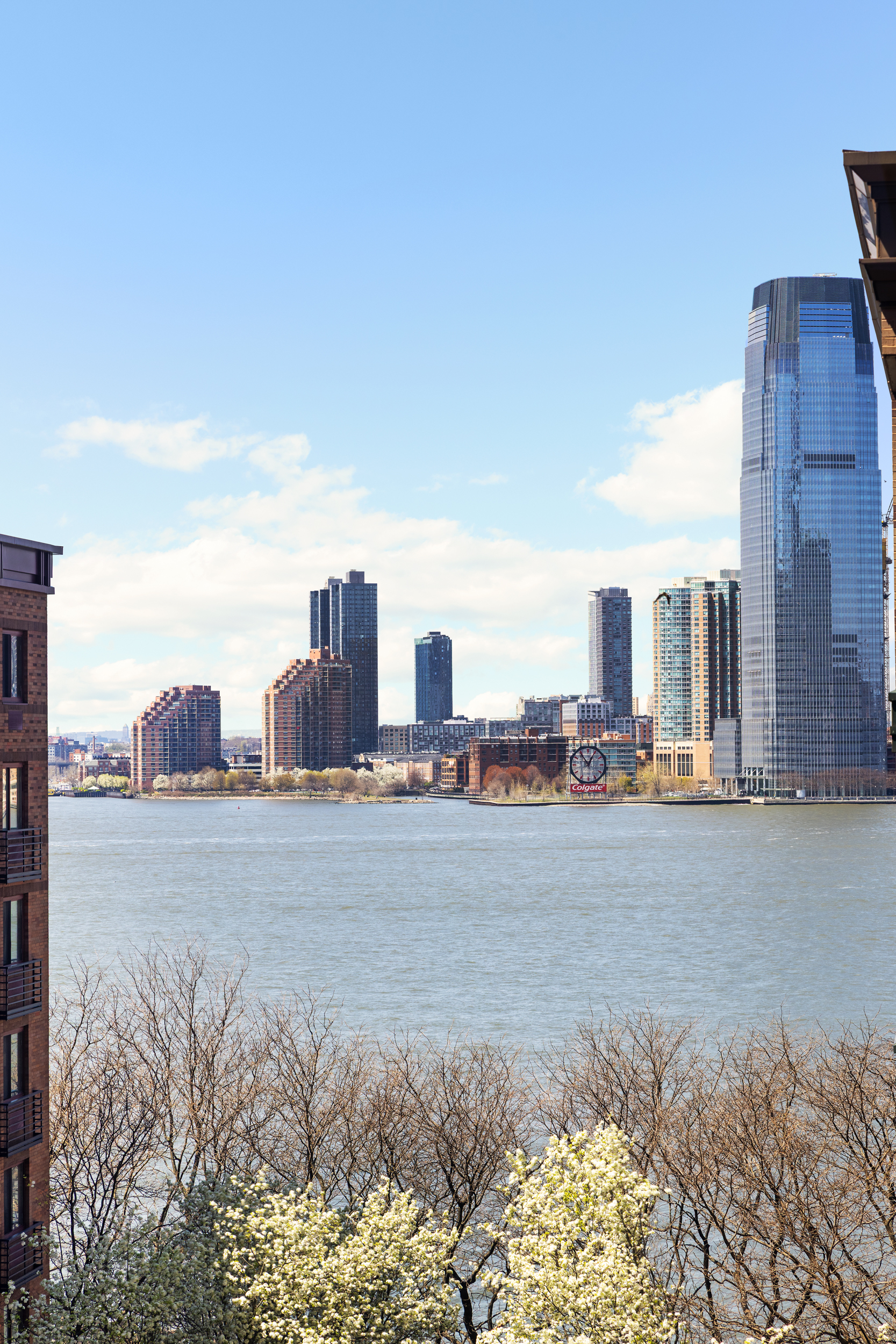 70 Little West Street, Unit 7L Manhattan, NY 10004 - Photo 9 of 25 a view of a city with tall buildings