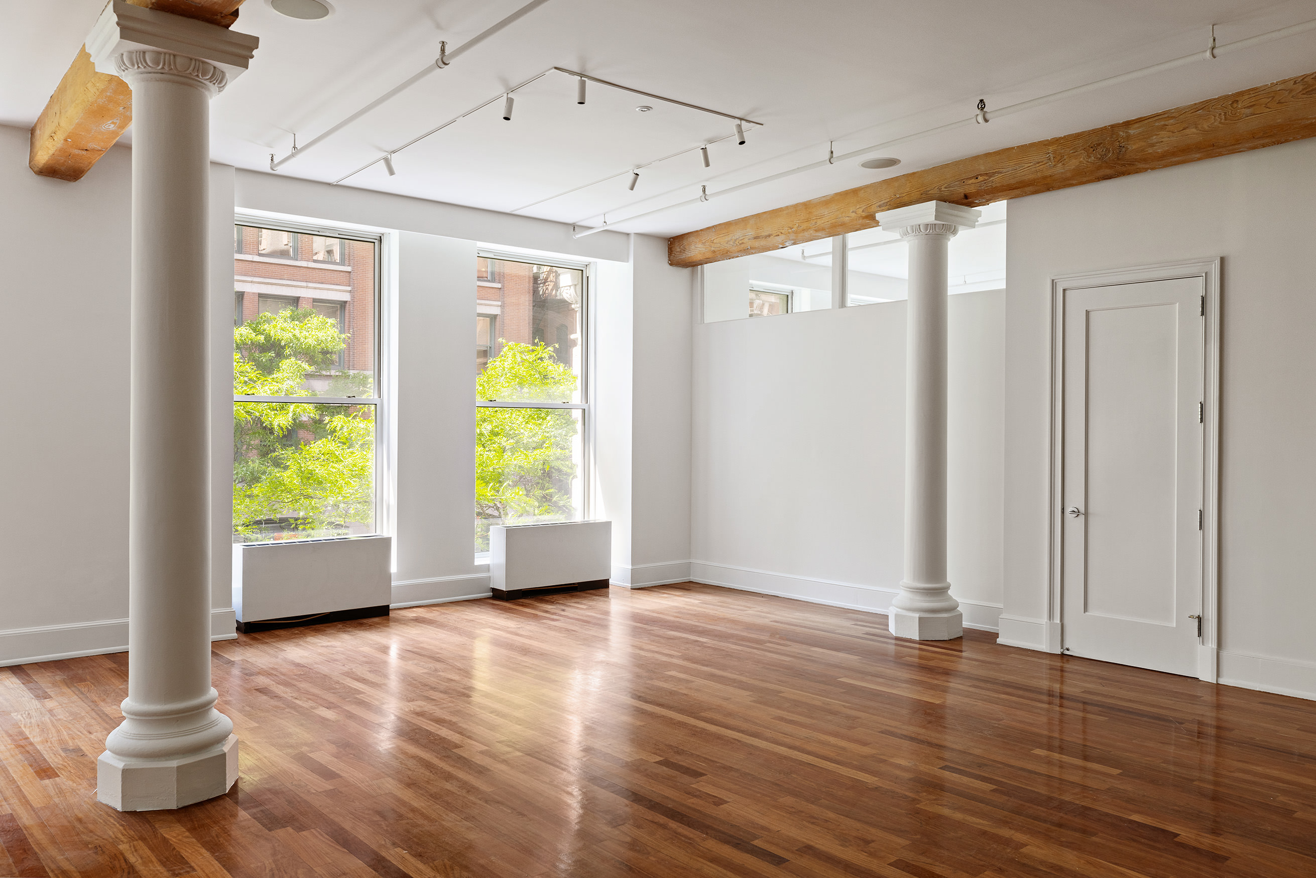 285 Lafayette Street, Unit 2B Manhattan, NY 10012 - Photo 5 of 19 a view of livingroom with furniture wooden floor and windows