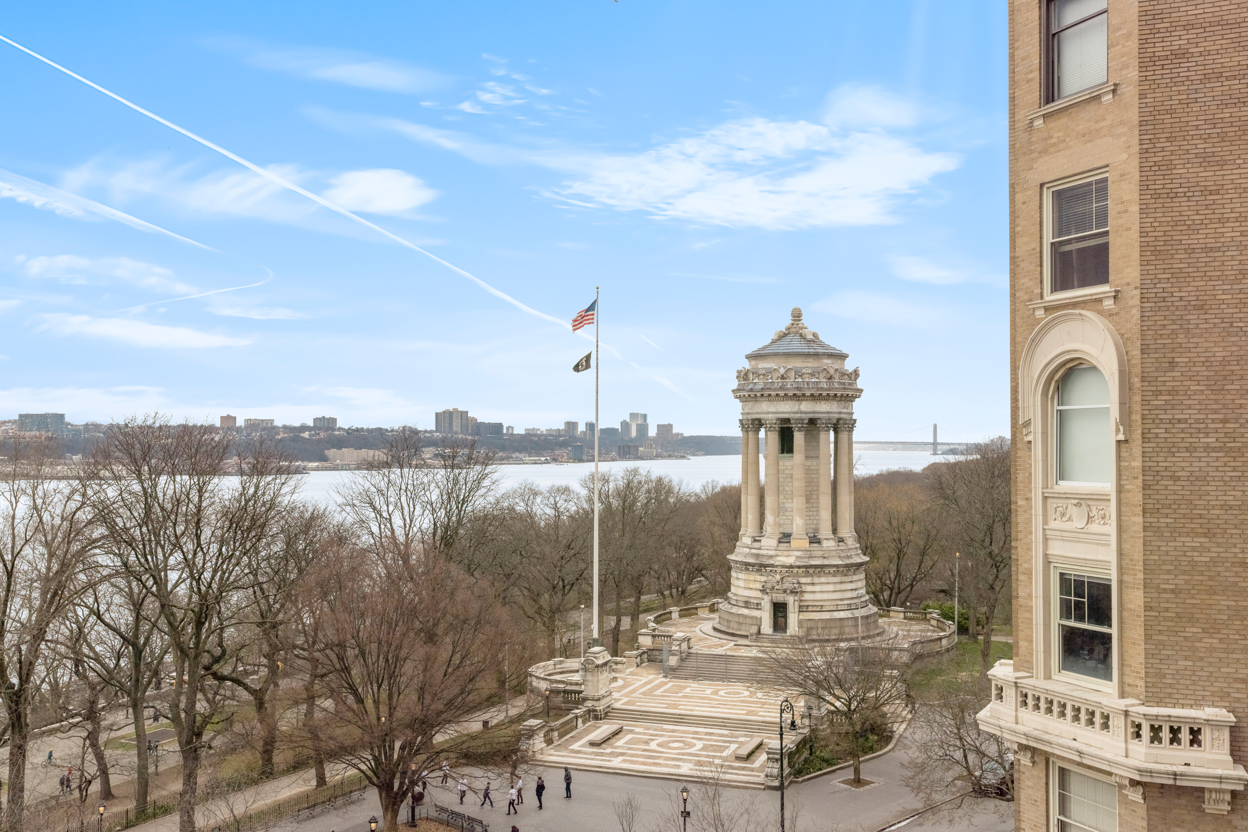 155 Riverside Drive, Unit 6B Manhattan, NY 10024 - Photo 2 of 8 a view of a city with a fountain in the background