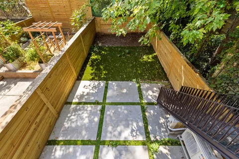 a view of swimming pool with a balcony