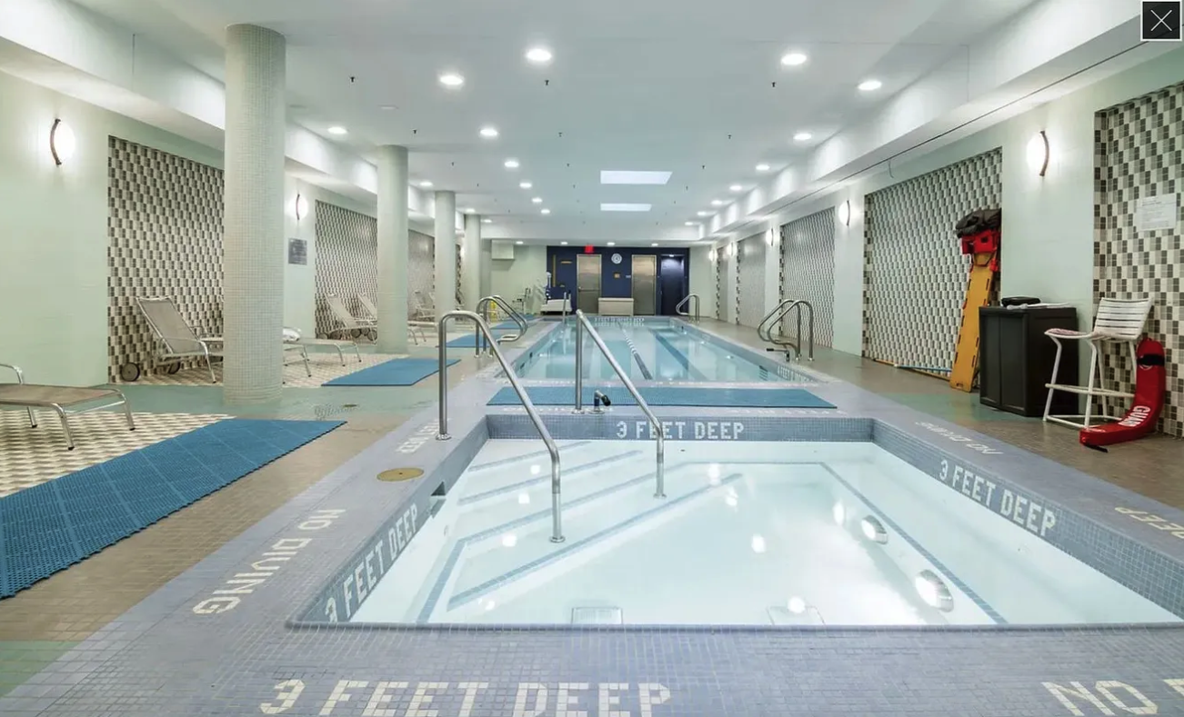 120 Riverside Boulevard, Unit 10W Manhattan, NY 10069 - Photo 11 of 13 a view of a living room and a kitchen