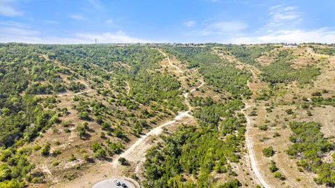 a view of a city with an outdoor space