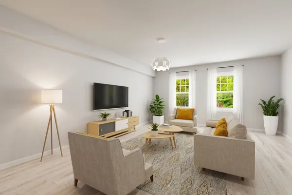 a living room with furniture and a flat screen tv