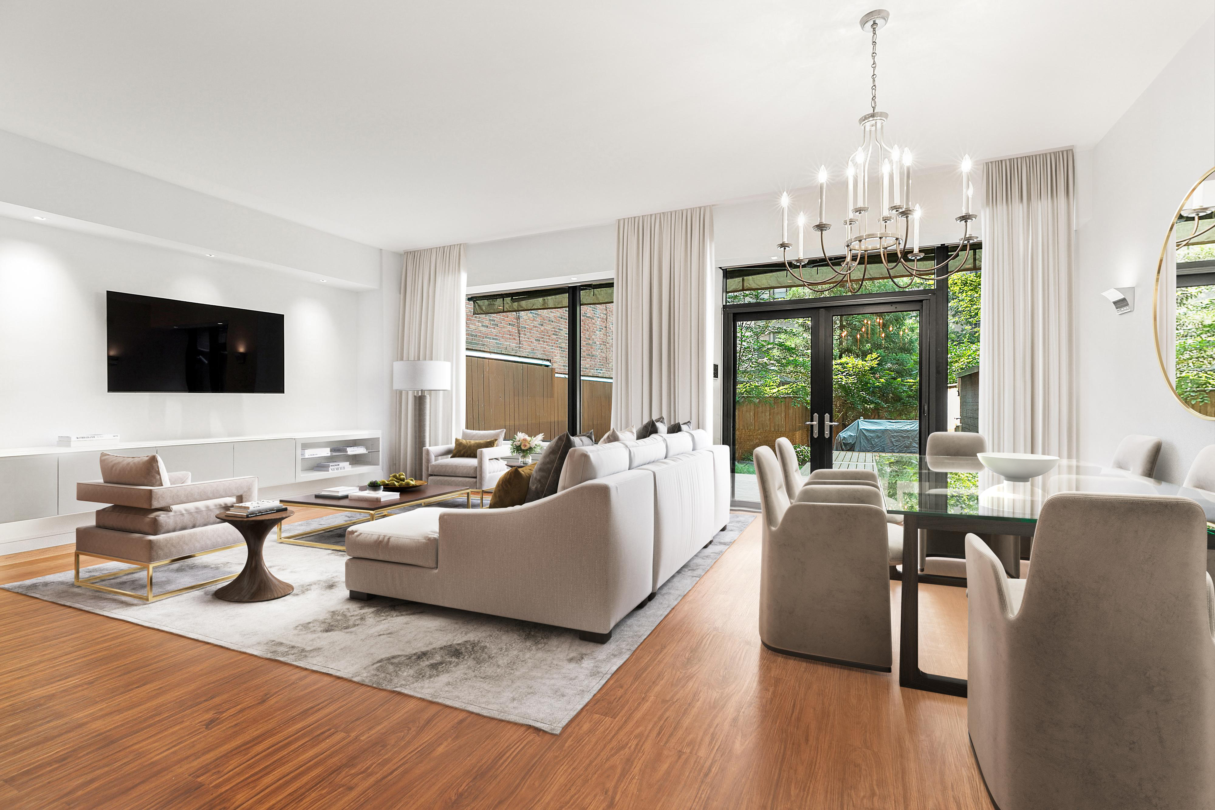 255 Hudson Street, Unit TH1 Manhattan, NY 10013 - Photo 1 of 10 a living room with fireplace furniture and a flat screen tv