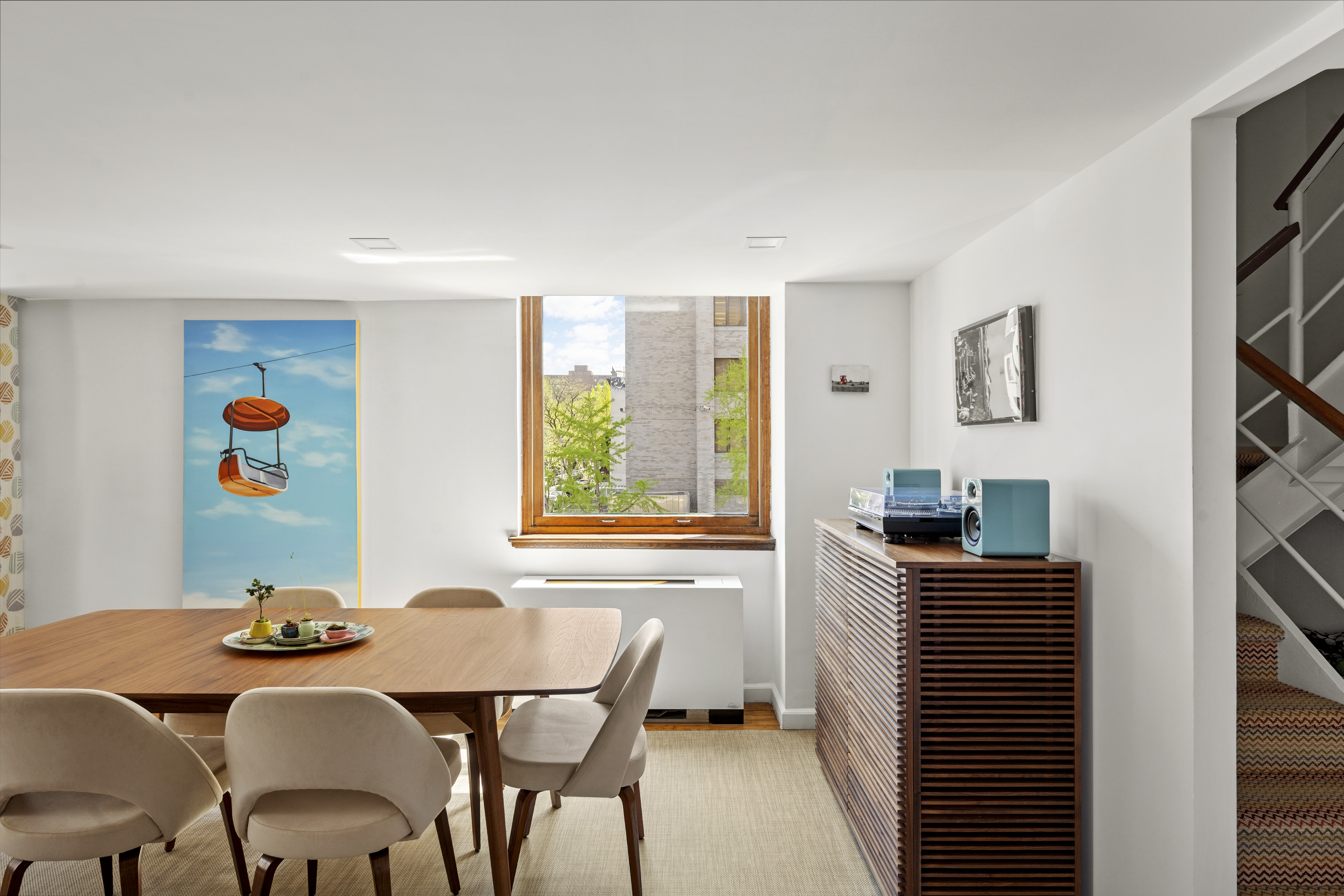 305 2nd Avenue, Unit 325 Manhattan, NY 10003 - Photo 3 of 22 a dining room with furniture and window