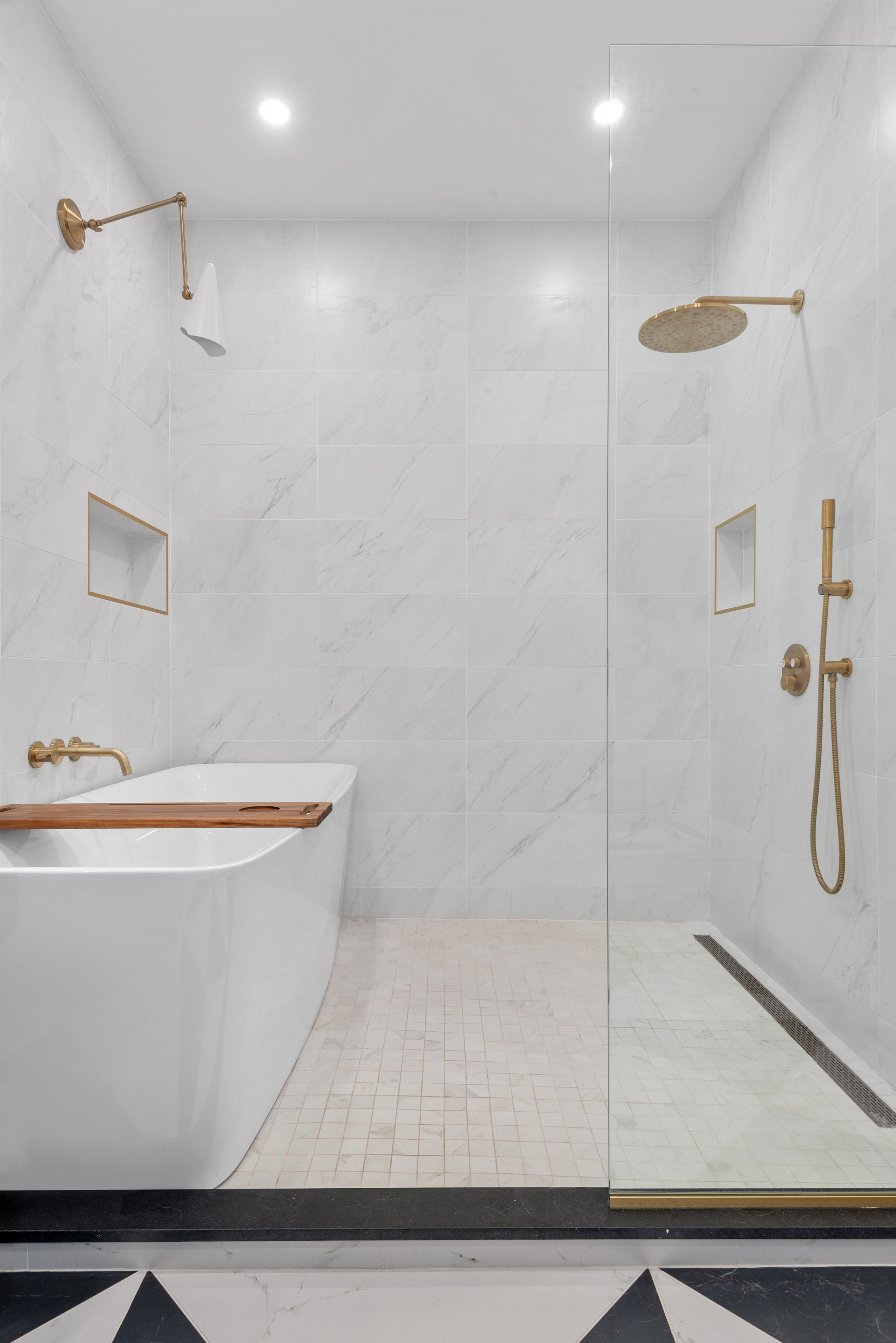 30 Weirfield Street Brooklyn, NY 11221 - Photo 14 of 29 a bathroom with a bathtub and a shower