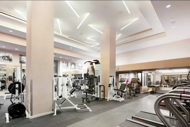 80 Riverside Boulevard, Unit 12D Manhattan, NY 10069 - Photo 10 of 16 a view of a room with gym equipment