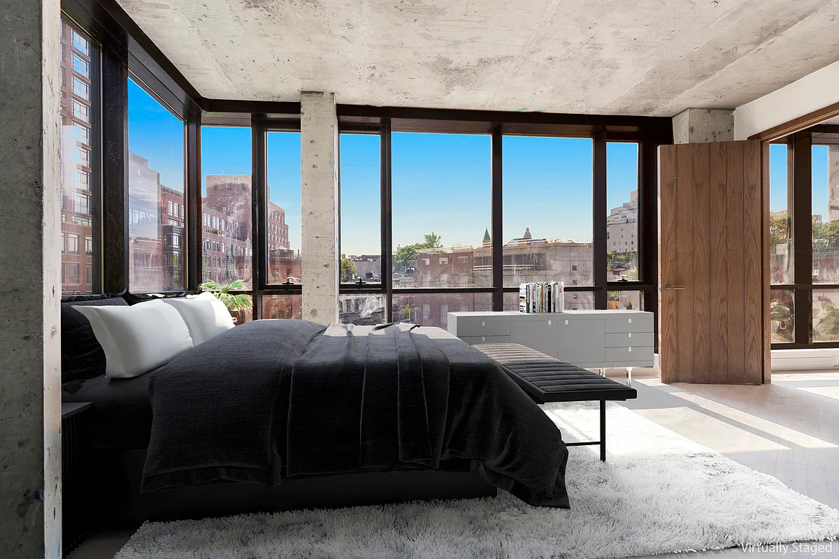 200 West 11th Street, Unit PH Manhattan, NY 10014 - Photo 4 of 5 a bedroom with a bed and large windows