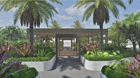 a front view of a house with a garden