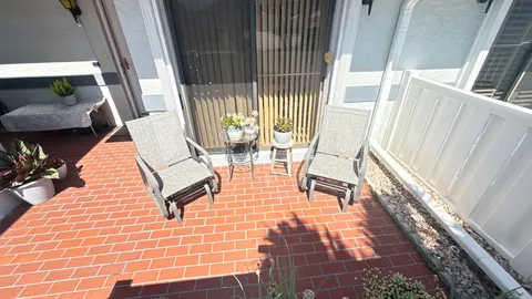 a view of an outdoor space with seating area