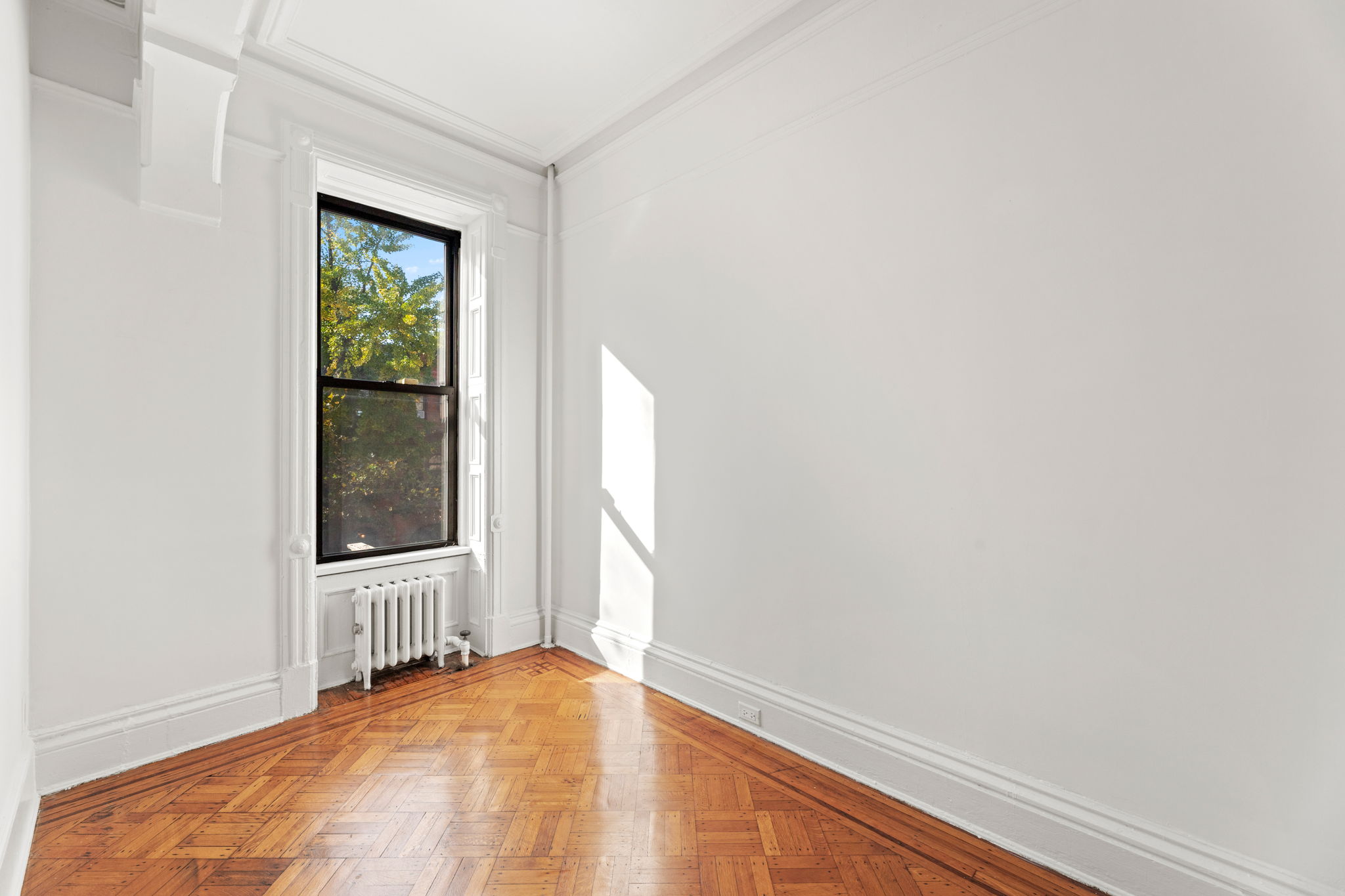 149 Sterling Place, Unit 3 Brooklyn, NY 11217 - Photo 5 of 9 a view of an empty room with a window