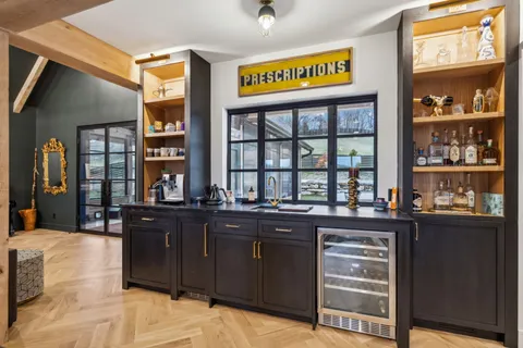 a group of people sitting in front of a building