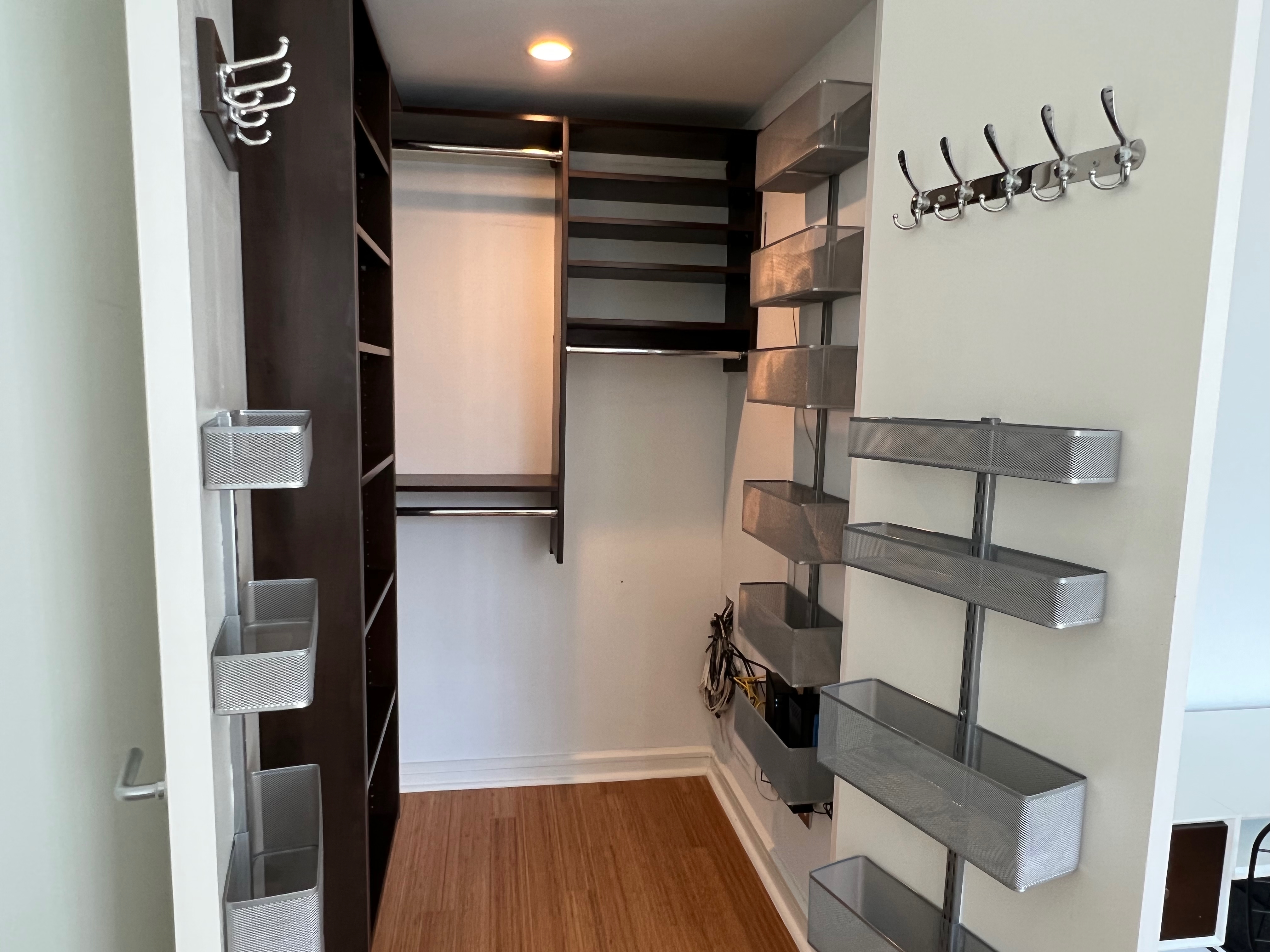 350 West 53rd Street, Unit PHA Manhattan, NY 10019 - Photo 19 of 35 a view of walk in closet with clothes and shoes