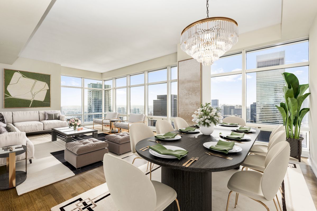 151 East 58th Street, Unit 39D Manhattan, NY 10022 - Photo 1 of 12 a living room with furniture and a large window