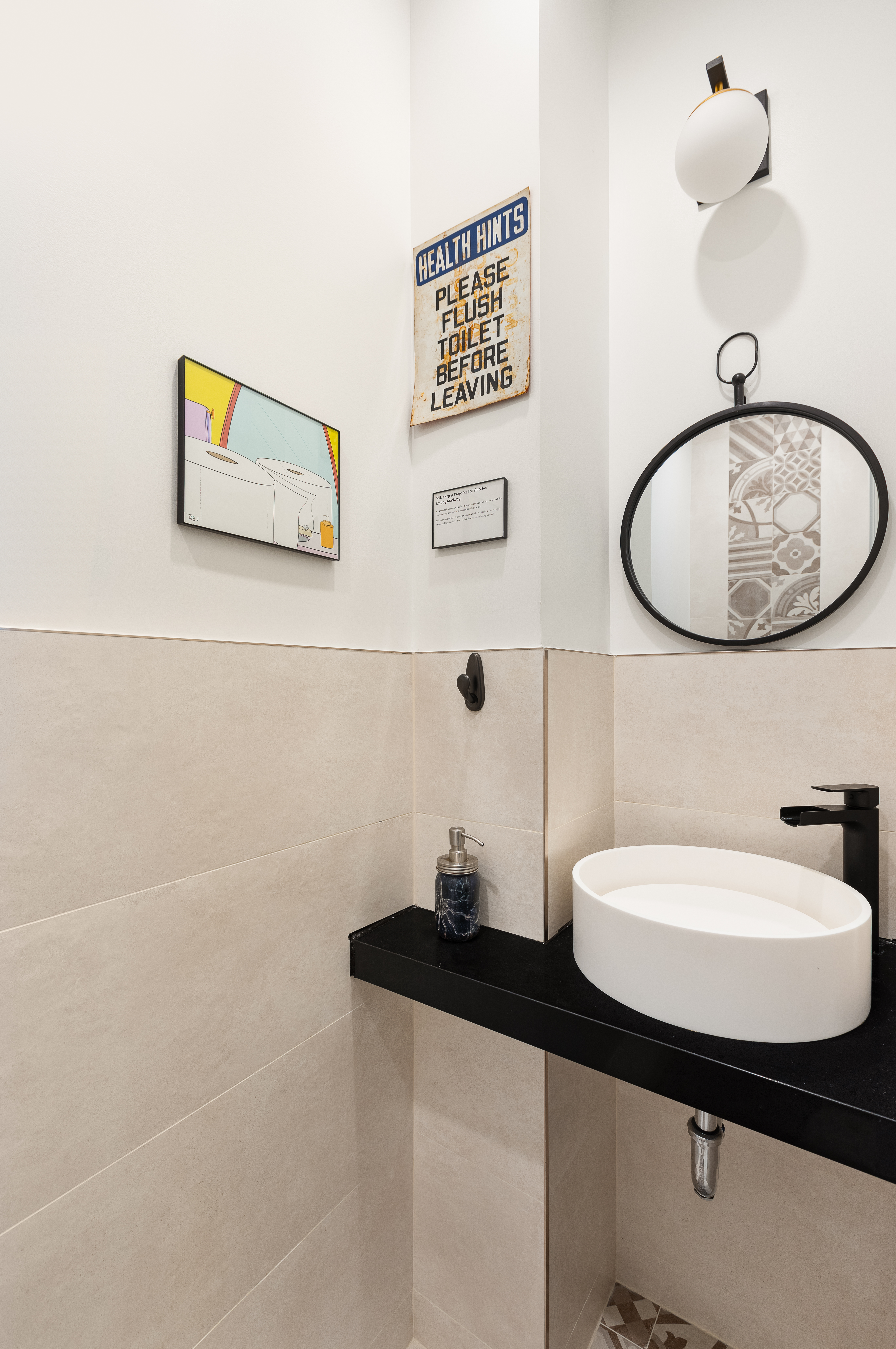 1122 Lafayette Avenue, Unit 4C Brooklyn, NY 11221 - Photo 9 of 14 a bathroom with a sink a mirror and a toilet