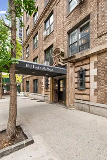 a view of a building with a street