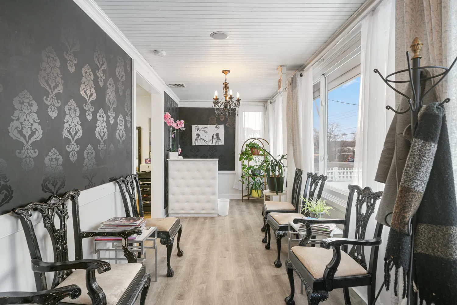 a view of a dining room with furniture window and wooden floor