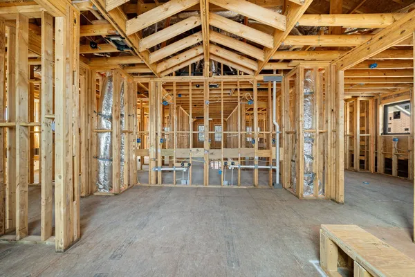 a living room with furniture and windows