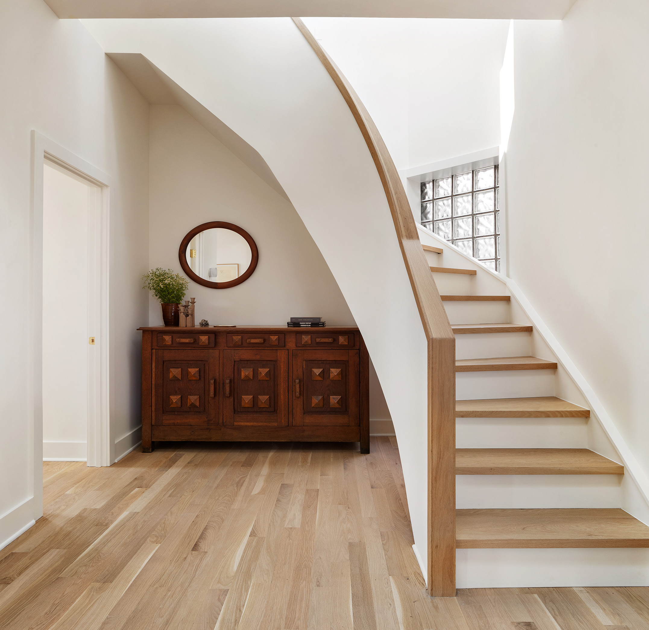 99 Avenue B, Unit PHDE Manhattan, NY 10009 - Photo 6 of 18 a view of a hallway with entryway wooden floor and front door
