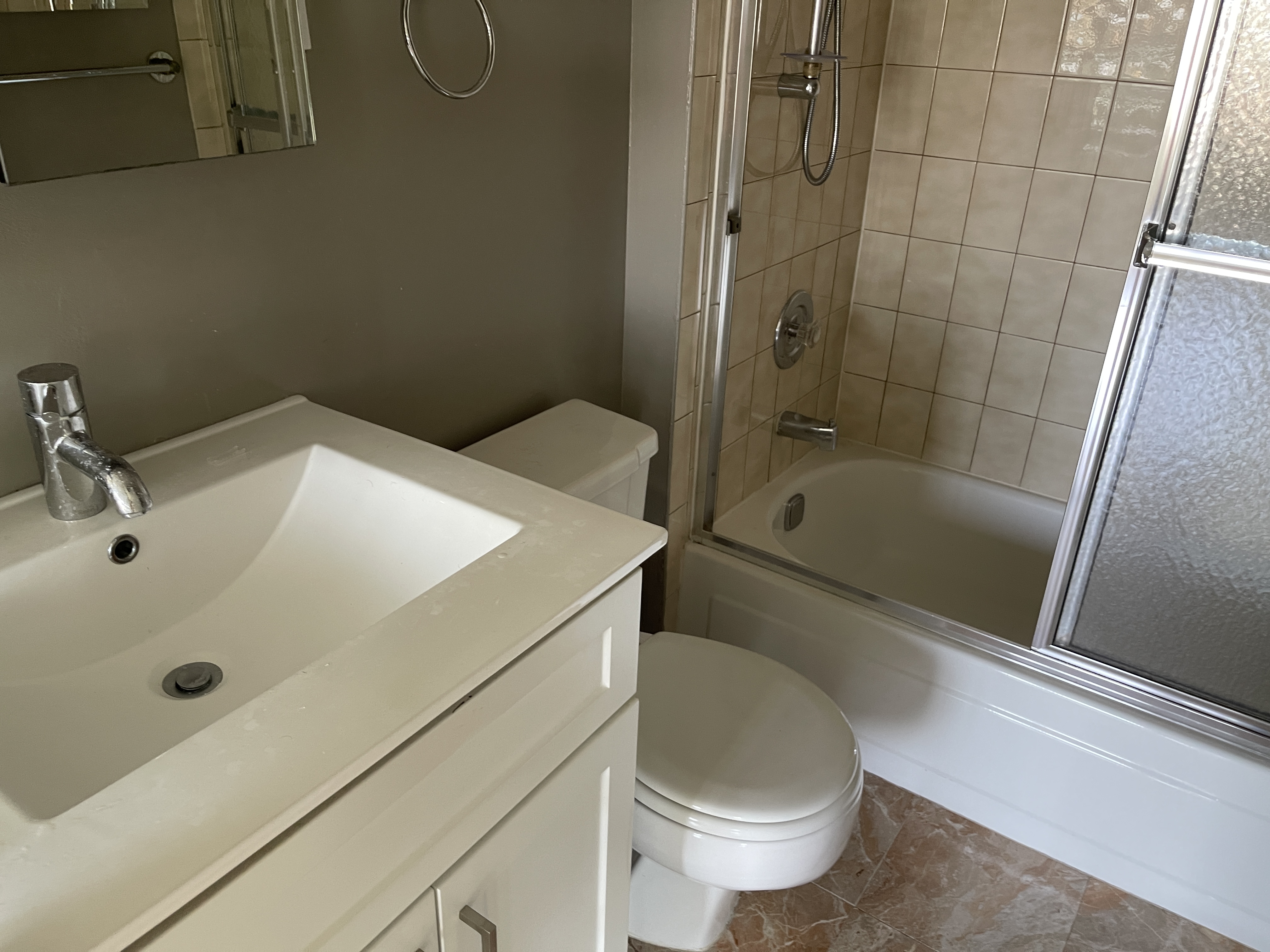 25-40 Shore Boulevard, Unit 6F Queens, NY 11102 - Photo 9 of 17 a bathroom with a sink and a tub