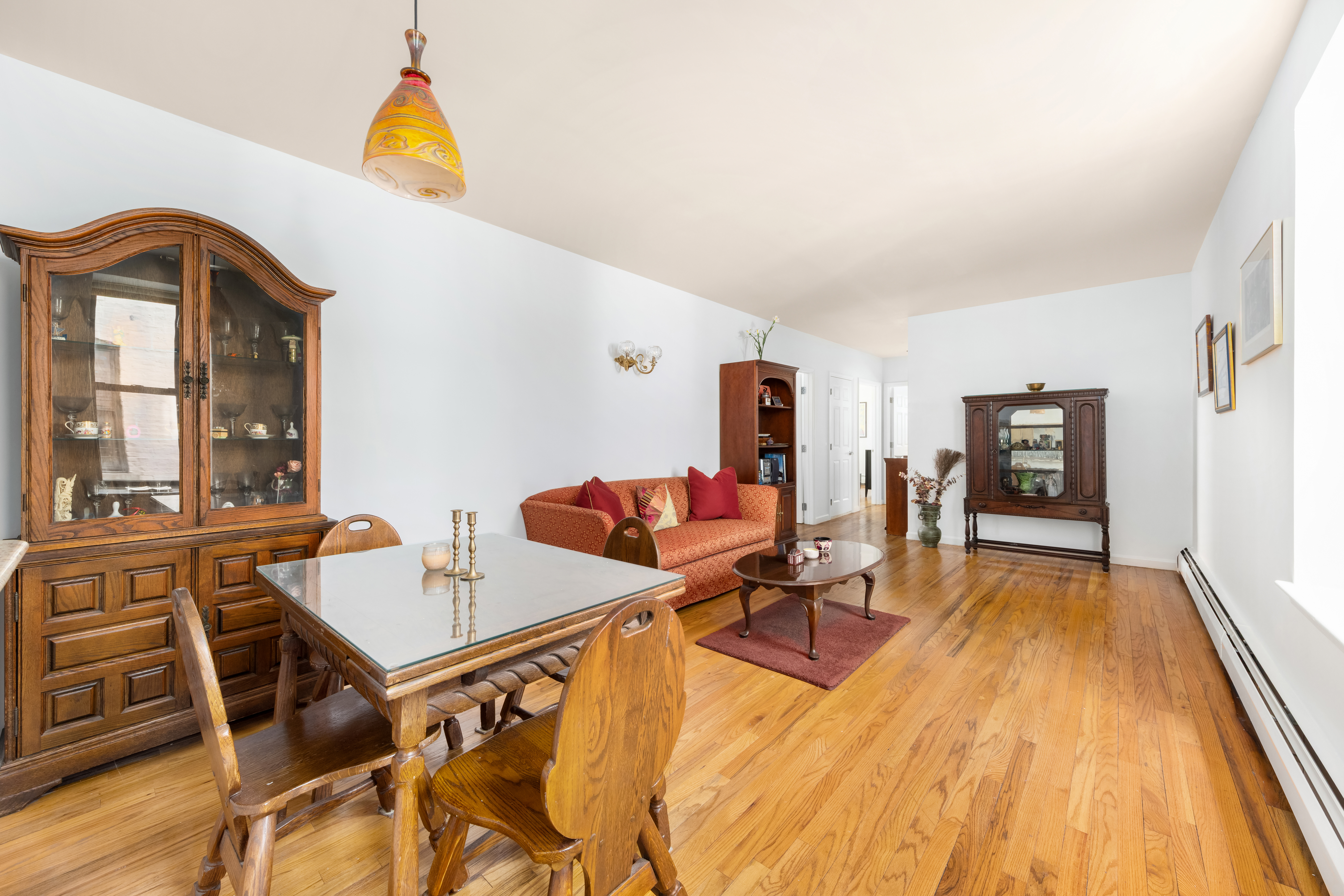 231 West 148th Street, Unit 2L Manhattan, NY 10039 - Photo 2 of 15 a living room with furniture