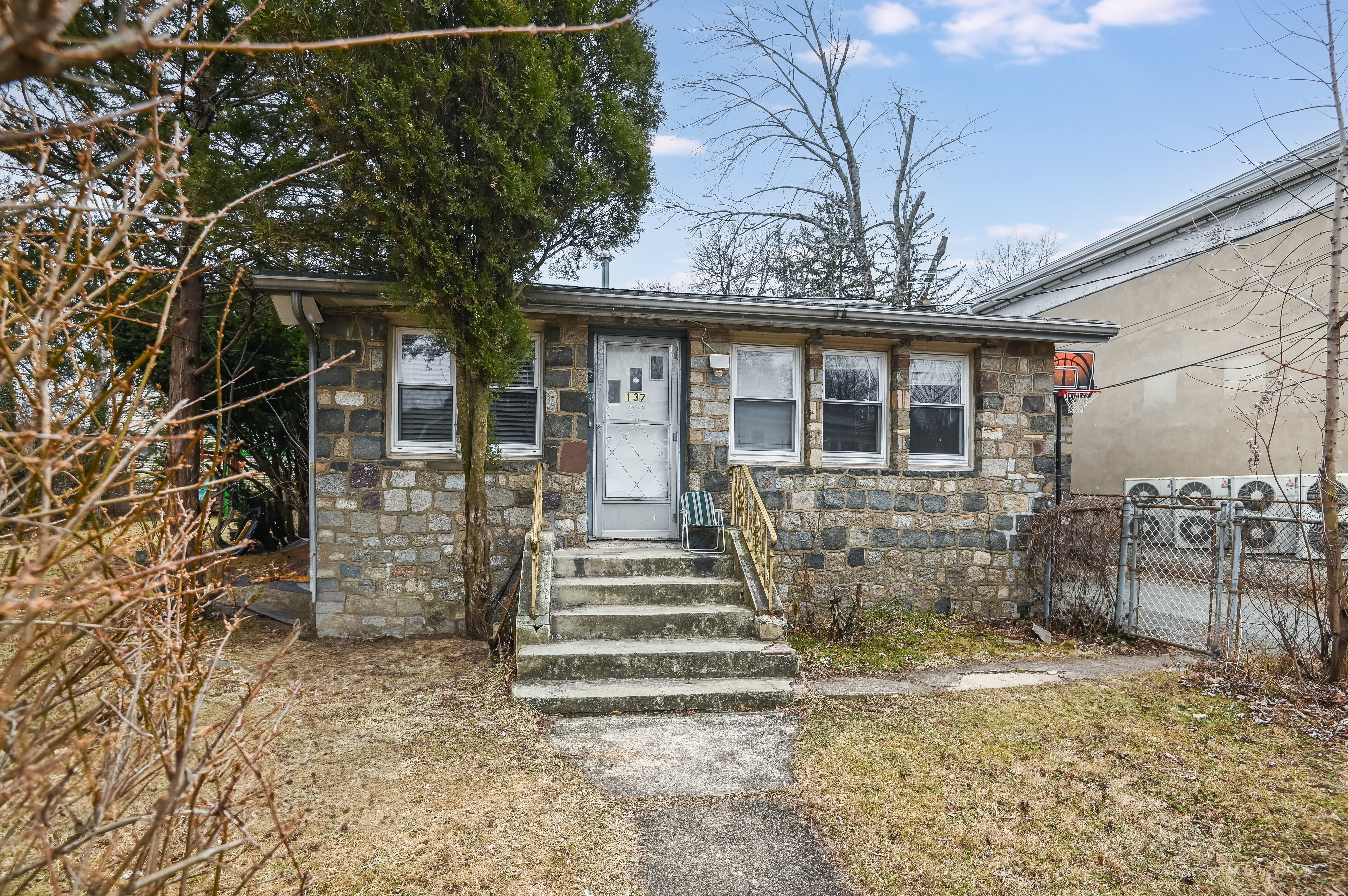 137 Hiawatha Boulevard Lake Hiawatha, NJ 07034 - Photo 21 of 21 a view of a house with a small yard and plants