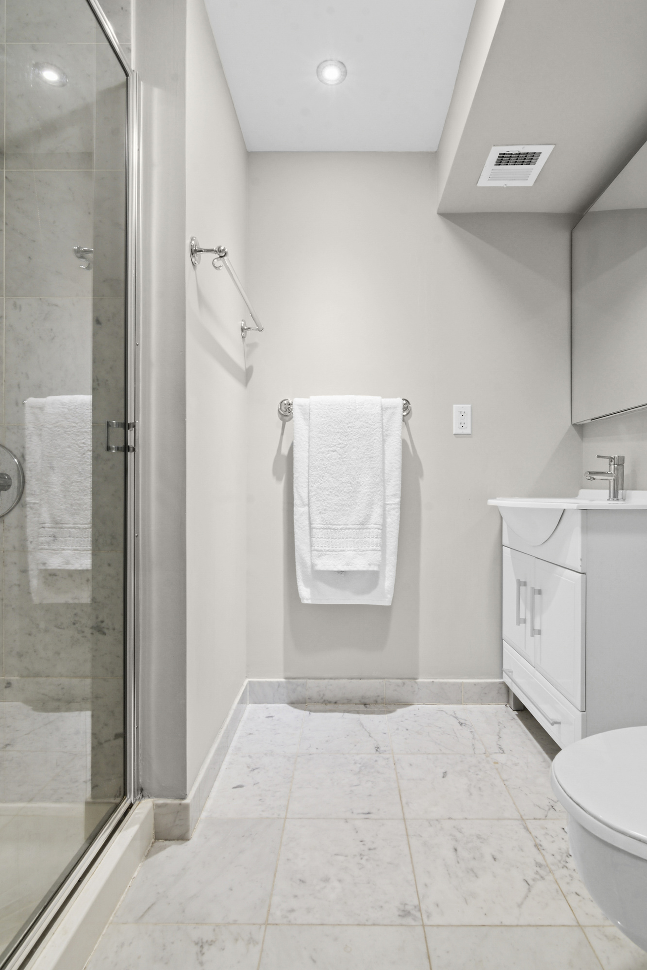 9511 Shore Road, Unit 606 Brooklyn, NY 11209 - Photo 8 of 17 a view of a storage & utility room with closet dryer and washer