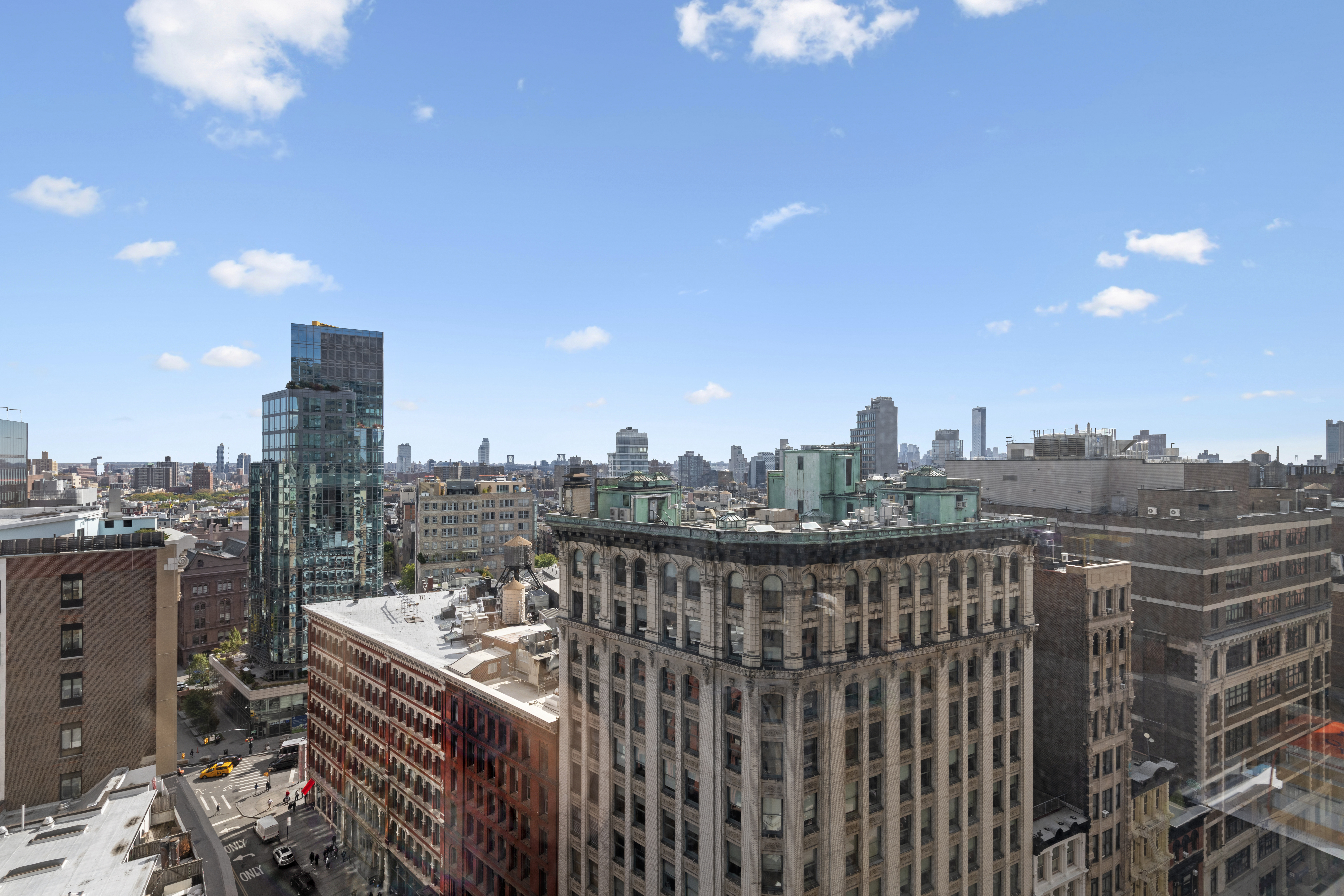 60 East 8th Street, Unit 20N Manhattan, NY 10003 - Photo 7 of 8 a view of a city skyline from a terrace