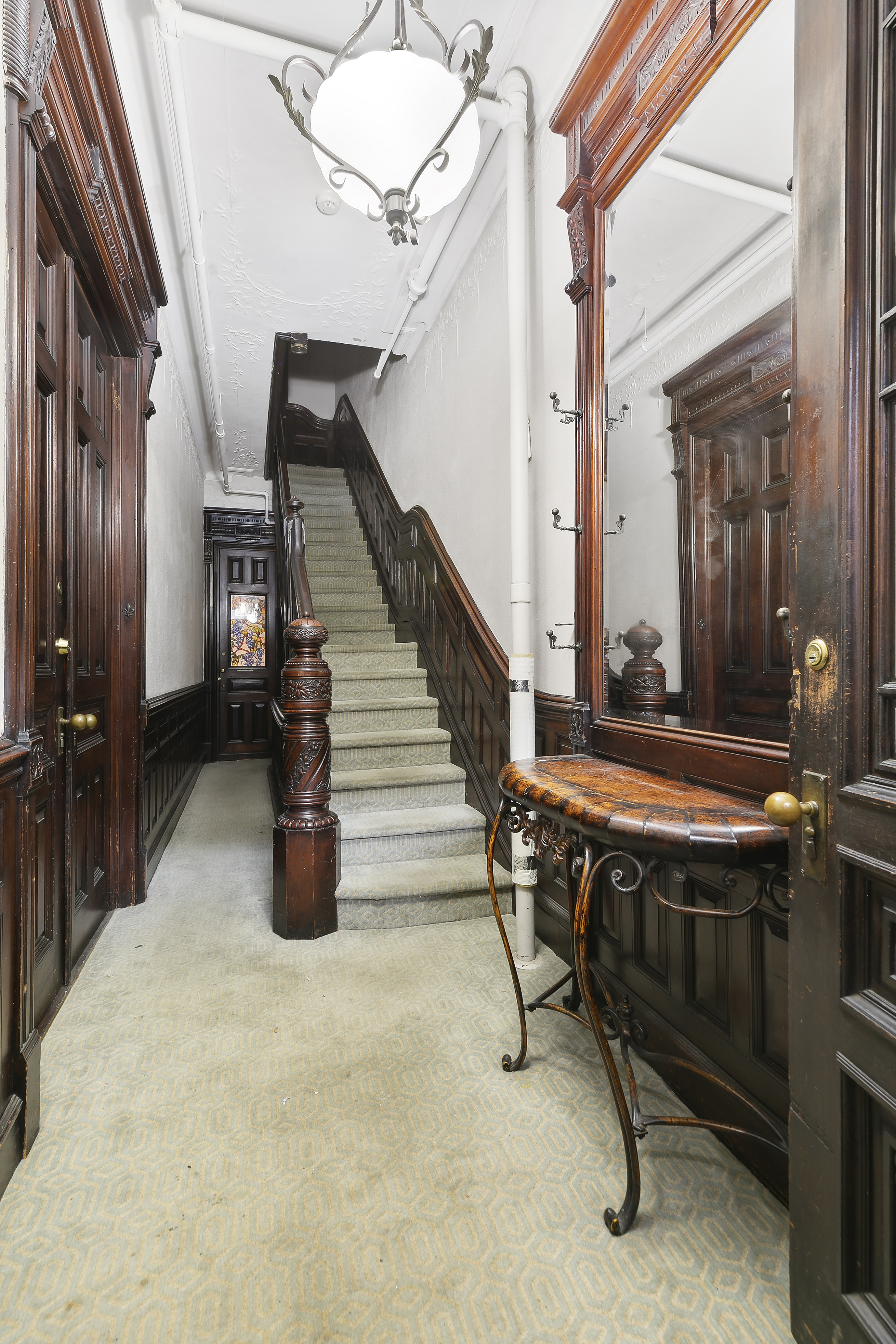 7 West 122nd Street Manhattan, NY 10027 - Photo 11 of 23 a room with lots of furniture and windows