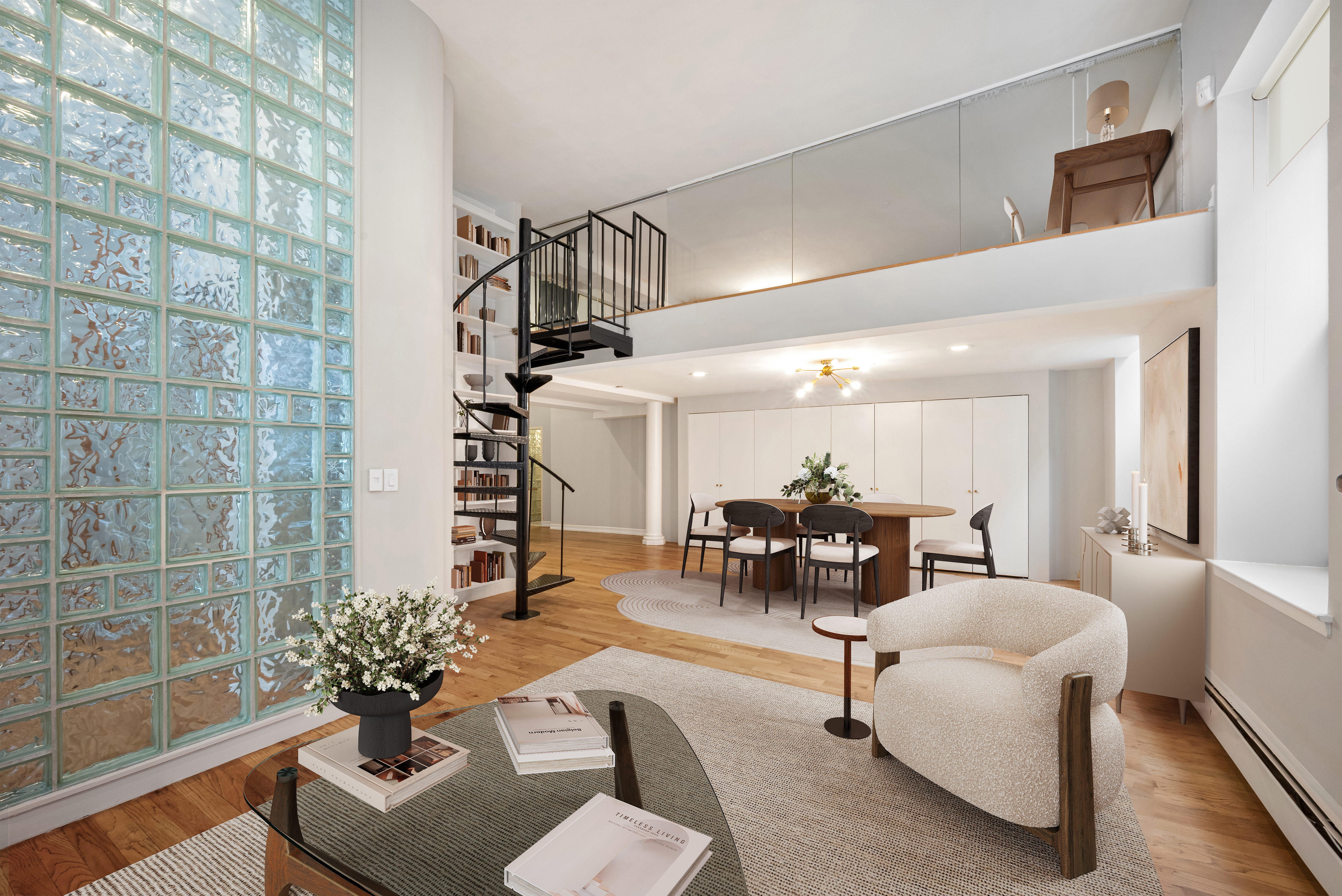 95 Greene Street, Unit 2F Manhattan, NY 10012 - Photo 5 of 8 a living room with furniture potted plant and a chandelier