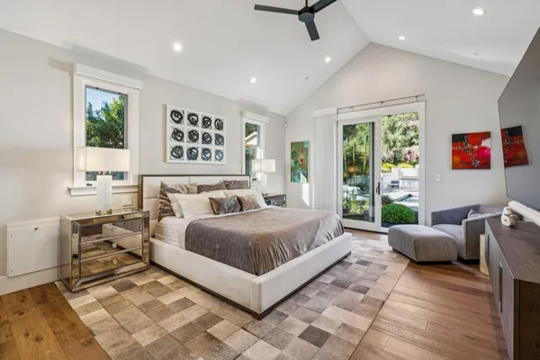 a view of a bathtub in a bathroom and a tub