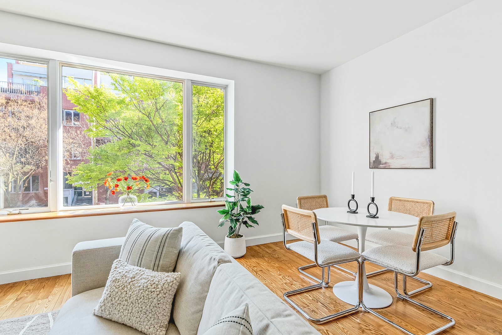 372 15th Street, Unit 2A Brooklyn, NY 11215 - Photo 3 of 10 a living room with furniture and a large window