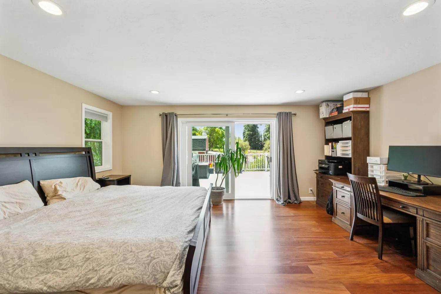 a view of a lake with furniture