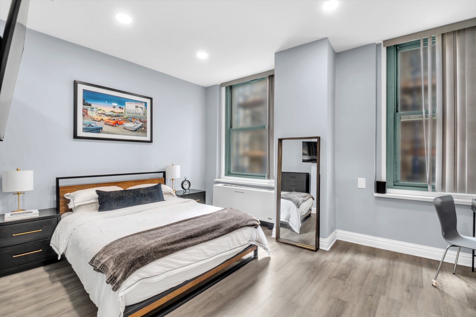 80 John Street, Unit 14D Manhattan, NY 10038 - Photo 7 of 8 a bedroom with a bed and a chair