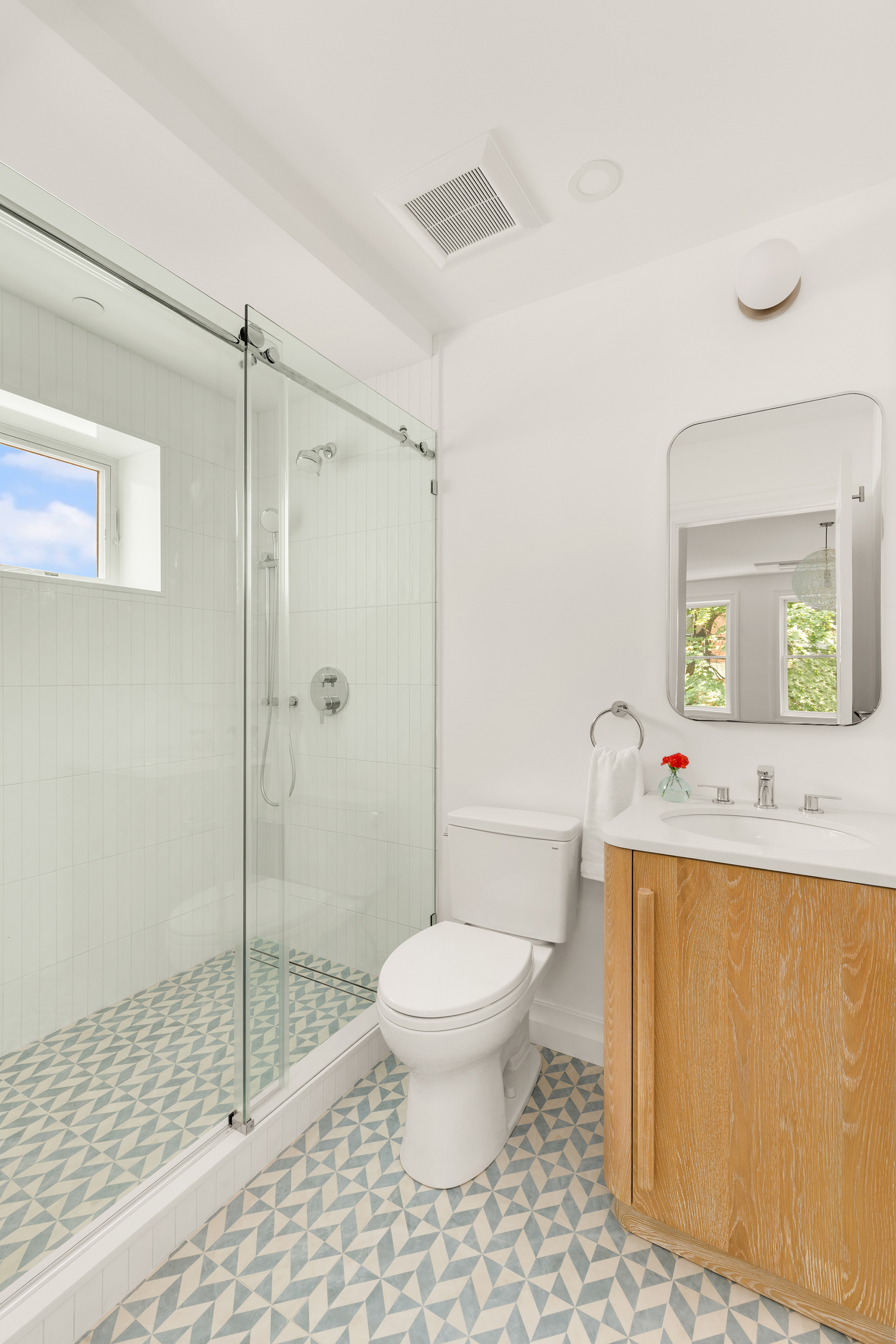 578 20th Street Brooklyn, NY 11218 - Photo 9 of 28 a bathroom with a toilet and a shower