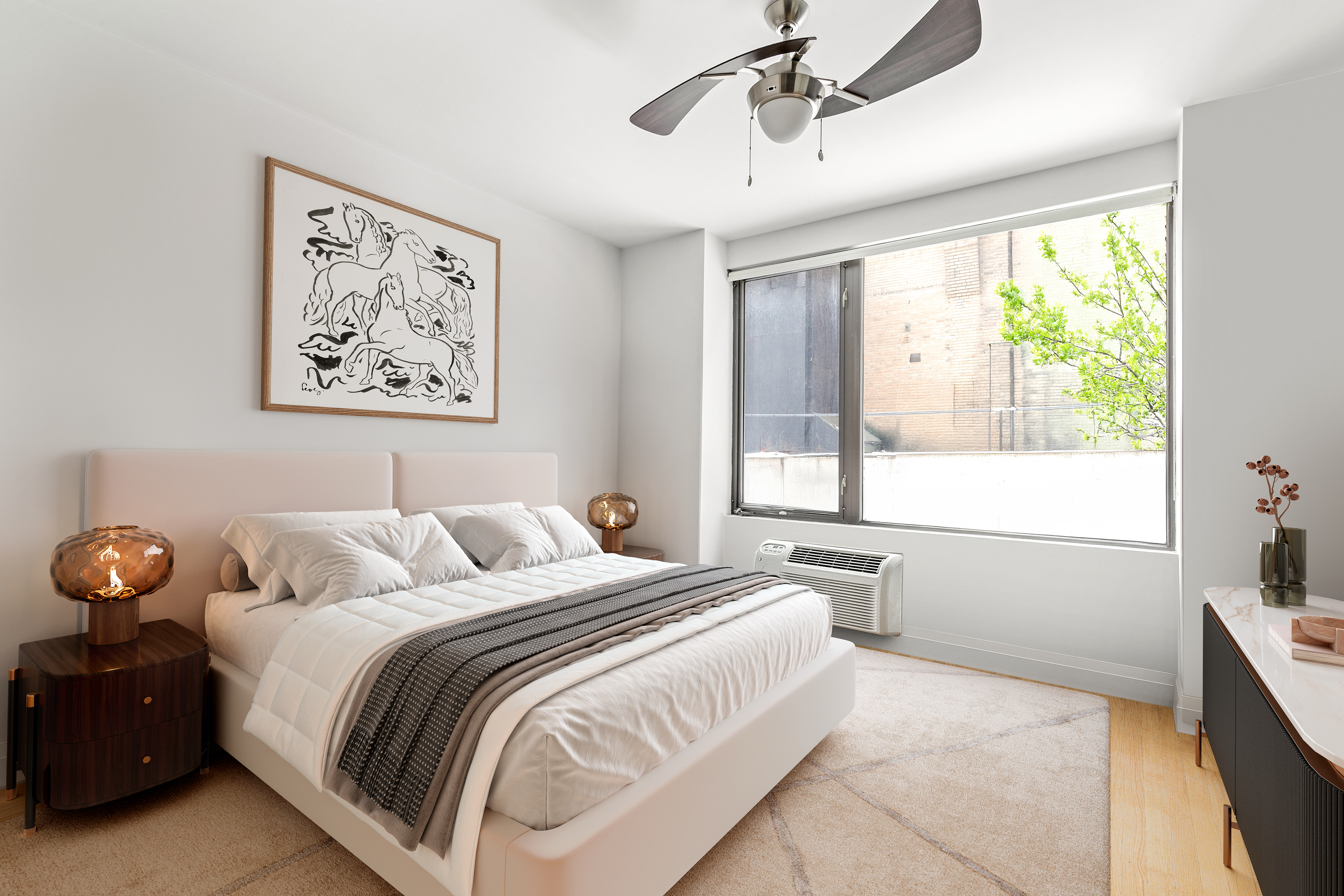 212 East 95th Street, Unit 2C Manhattan, NY 10128 - Photo 8 of 11 a bedroom with a bed and a window