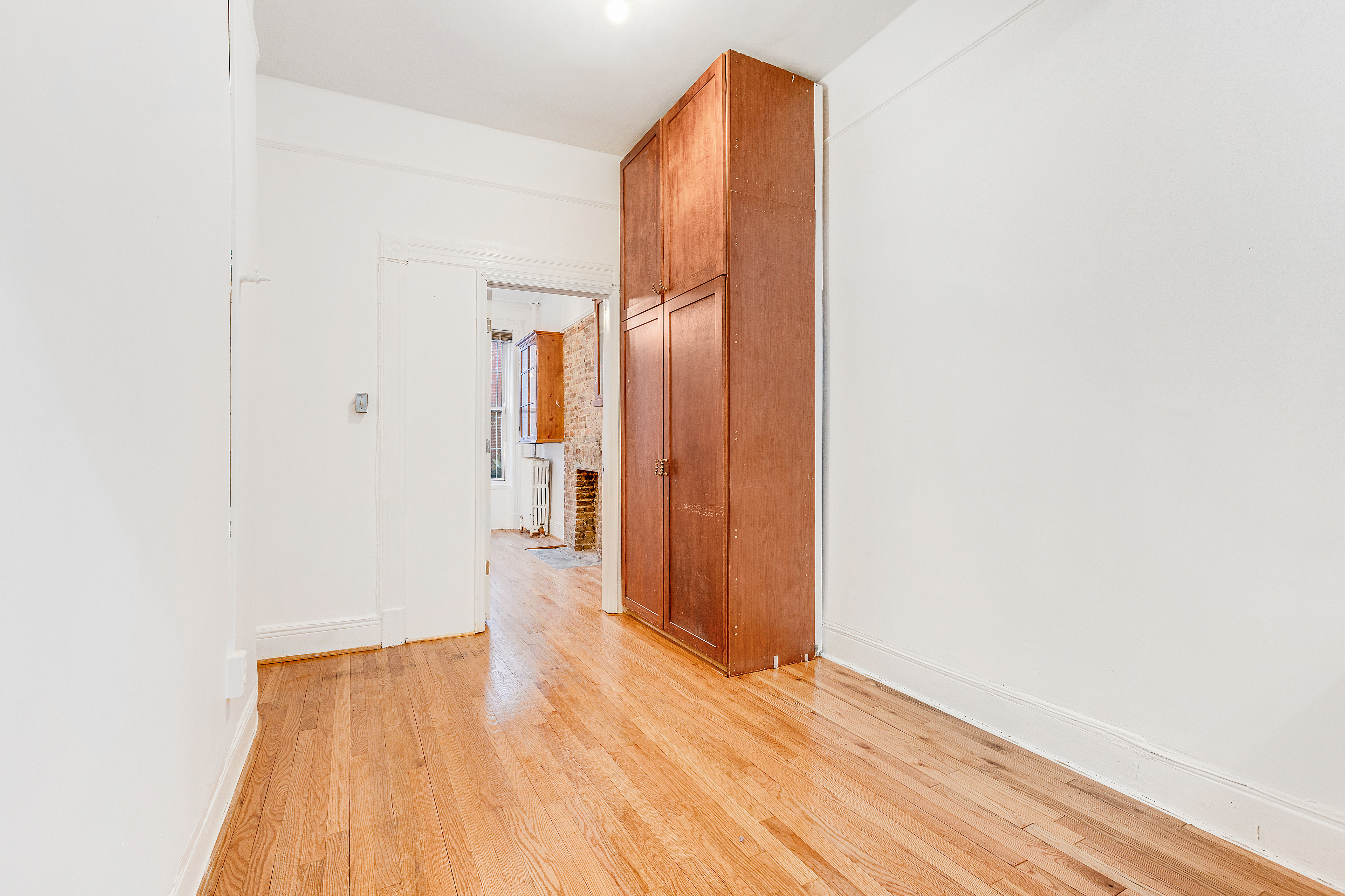 639 President Street, Unit 1L Brooklyn, NY 11215 - Photo 5 of 12 a view of a room with wooden floor