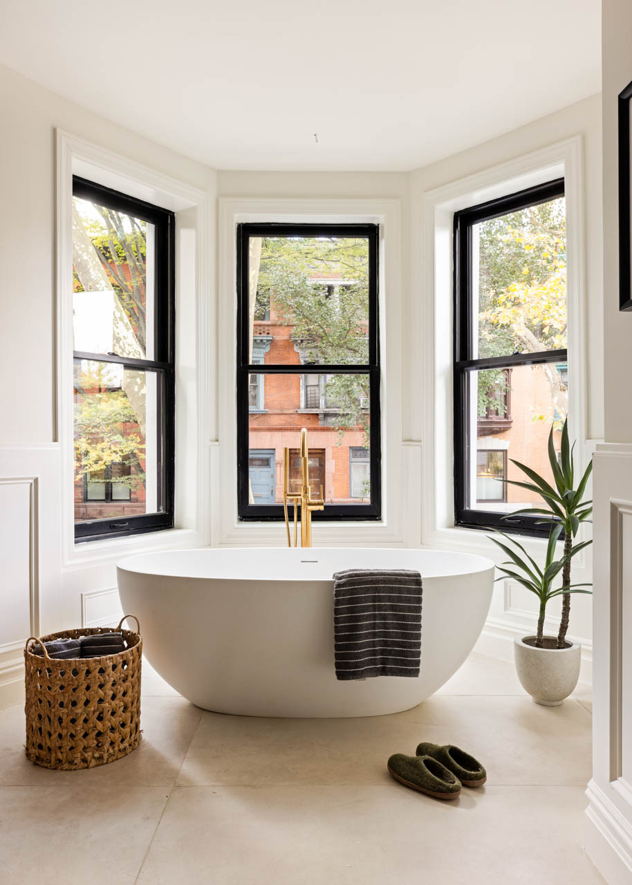 175 St James Place Brooklyn, NY 11238 - Photo 12 of 23 a living room with furniture and a large window