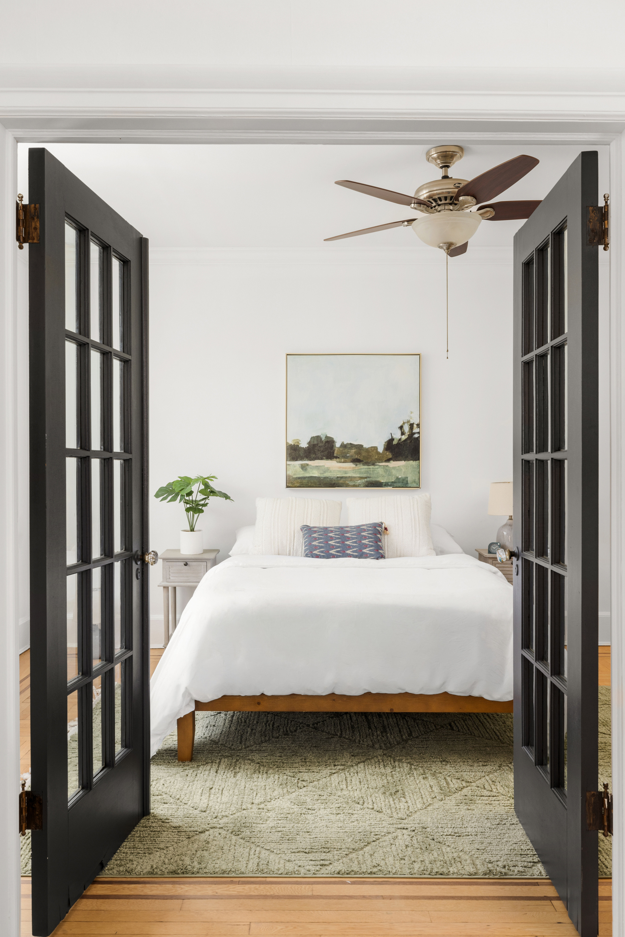 759 42nd Street, Unit 14 Brooklyn, NY 11232 - Photo 3 of 9 a bedroom with a bed painting on wall and a window